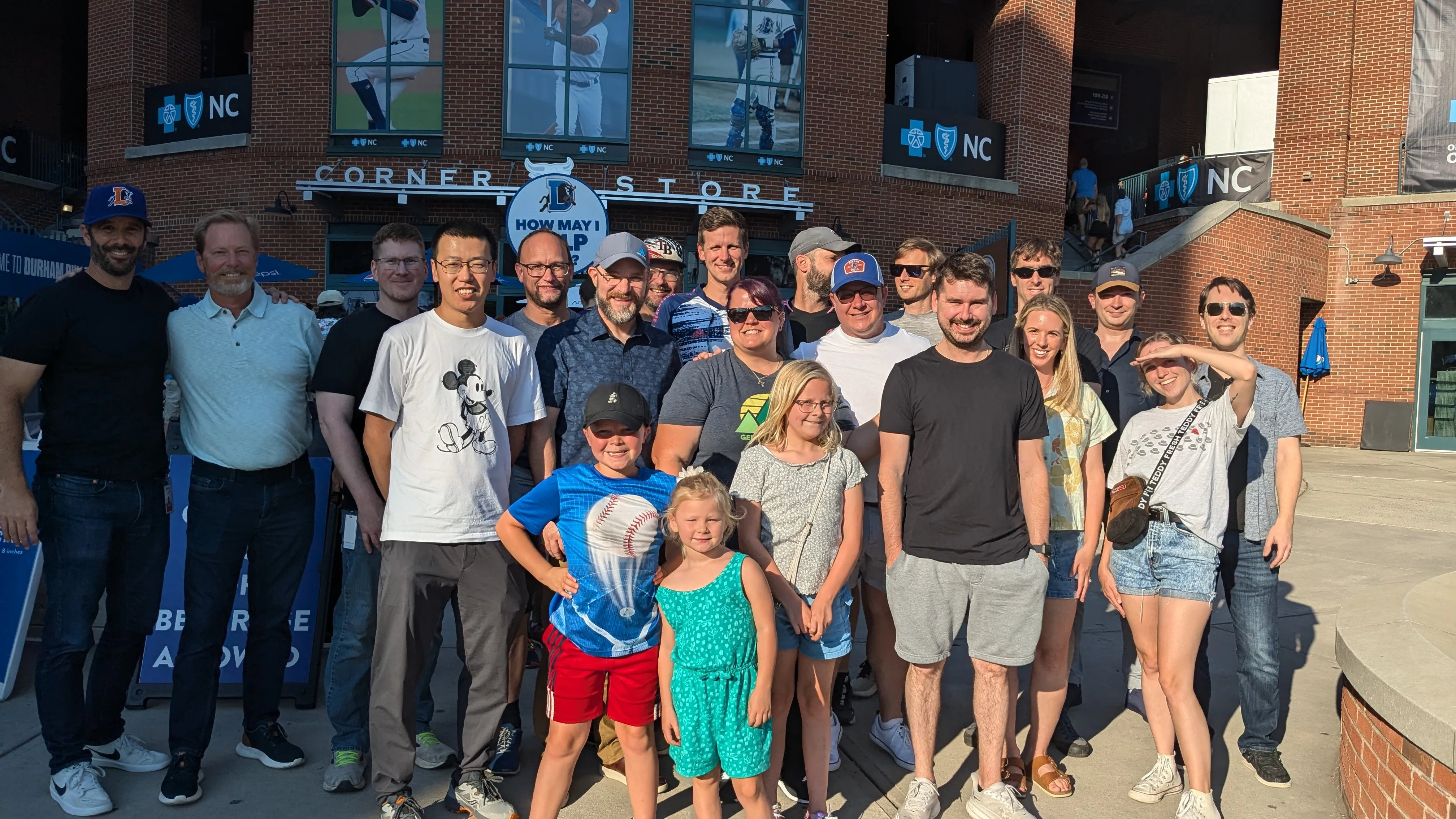 Mark's team in the front of Durham Baseball center